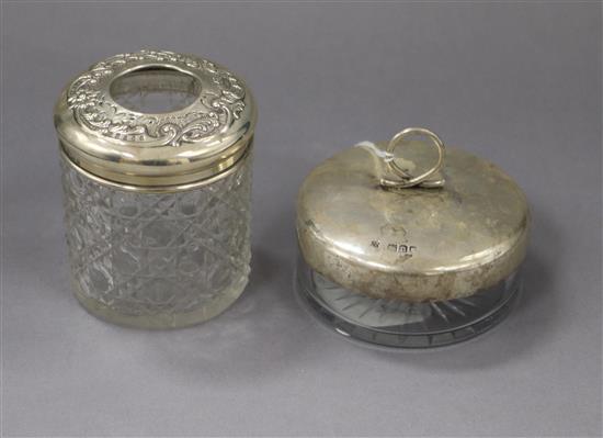 Two silver mounted glass pots.